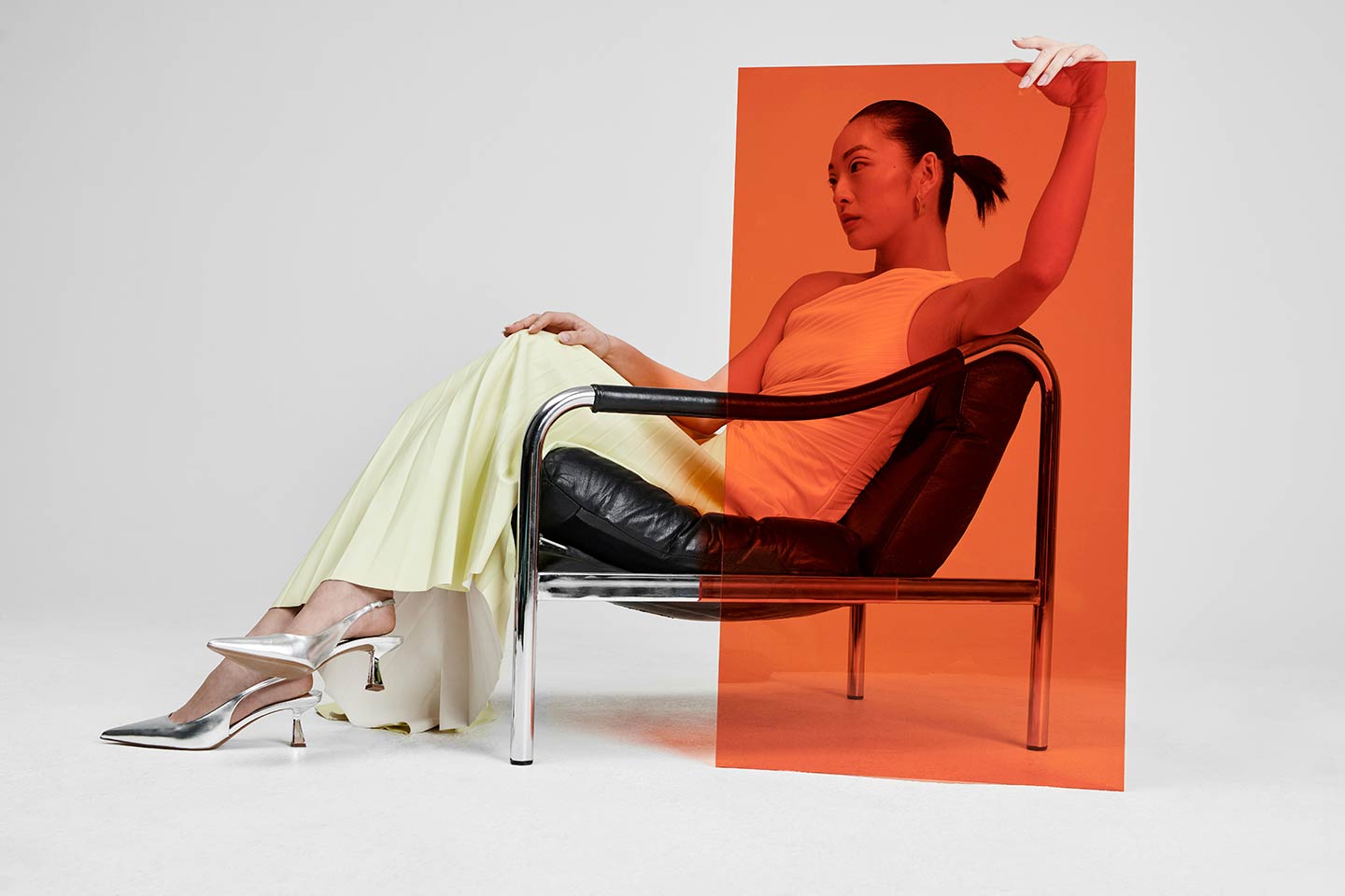 Woman in a chair for Mondrian Hotels