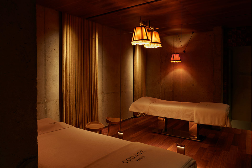 a spa treatment room with dim lighting