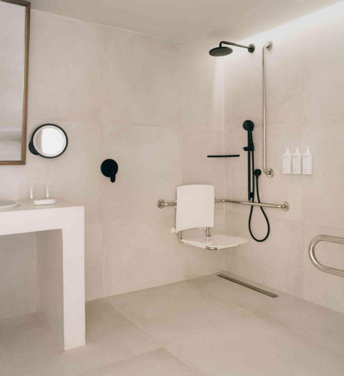 a modern bathroom with a waterfall shower