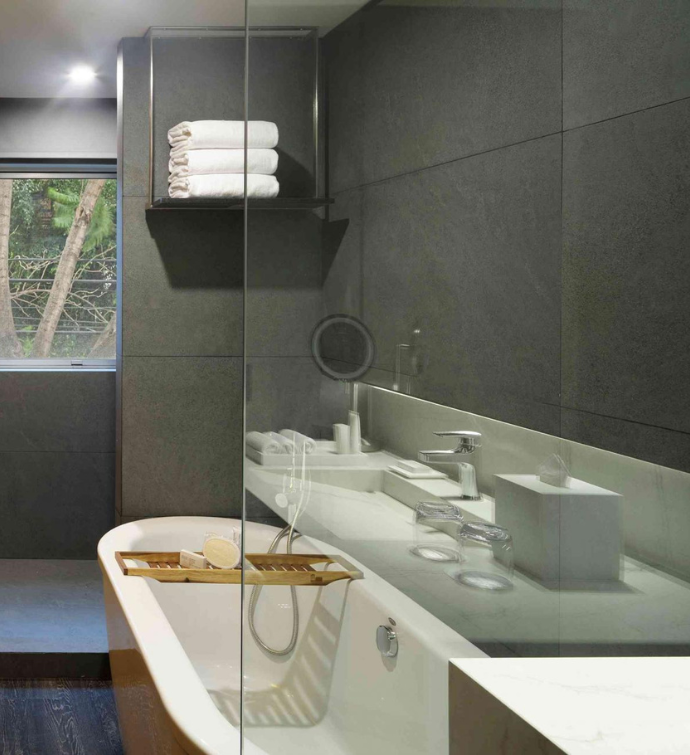 a sleek bathroom with a large tub