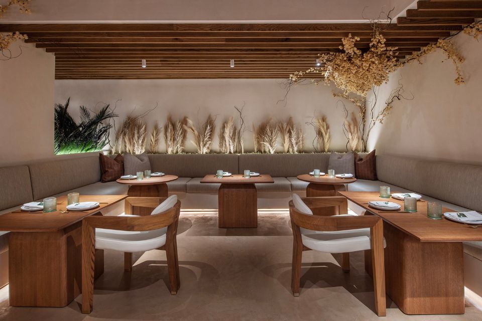 Interior of casa madera restaurant with wooden seating