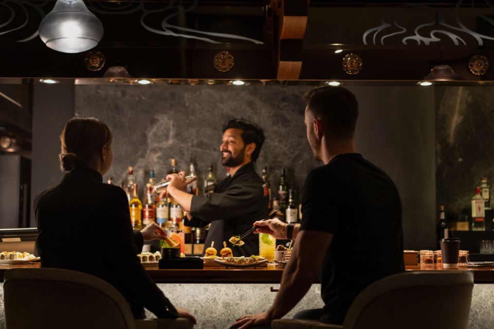 Bartender making a drink at Morimoto Doha's After Work Happy Hour