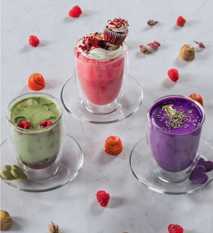 Green, red and purple smoothies at Ellamia Doha